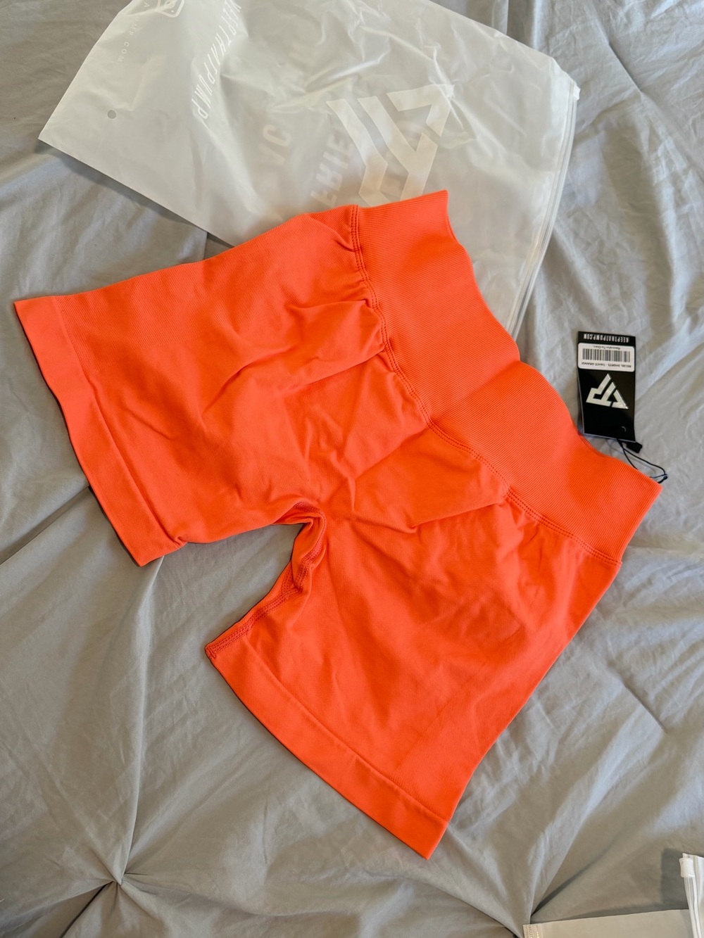 Keep That Pump orange shorts